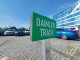 parking signs on a post mounted to concrete, stone, paving stones manufacturer