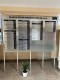 Mobile information board with a list, adjustable on wheels