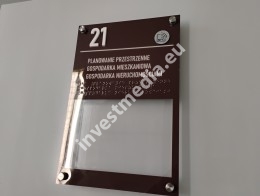 a sign for the blind with Braille and NFC