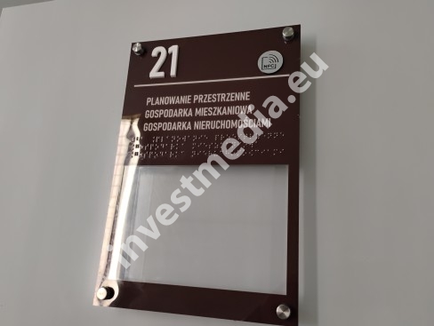 a sign for the blind with Braille and NFC