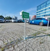 parking signs on a post mounted to concrete, stone, paving stones manufacturer