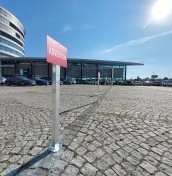 parking signs on a post mounted to concrete, stone, paving stones manufacturer