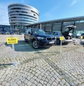 parking signs on a post mounted to concrete, stone, paving stones manufacturer